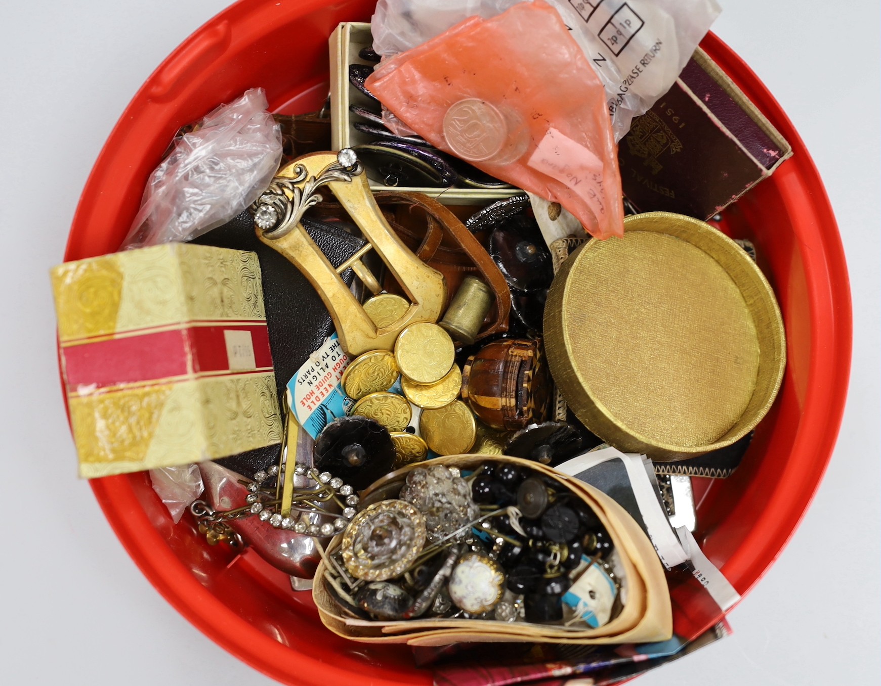 A selection of collectibles, including two silver photo frames, badge buttons, buckles, beading, coinage etc.